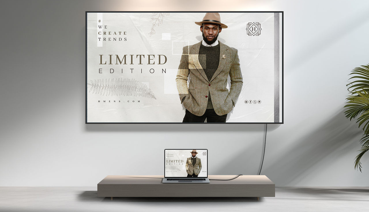 An image of an interactive board on the call and a laptop attached on a table.